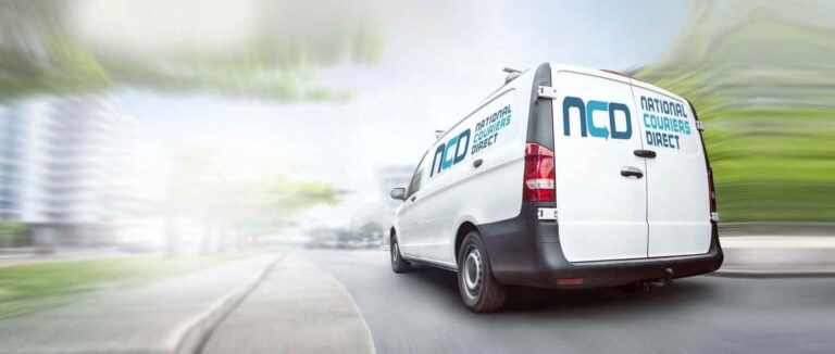 Courier van delivering parts to a dealership